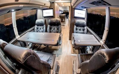 Vonlane bus interior with tables Vonlane bus interior with tables