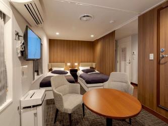 Queen Coral Cross Suite Room