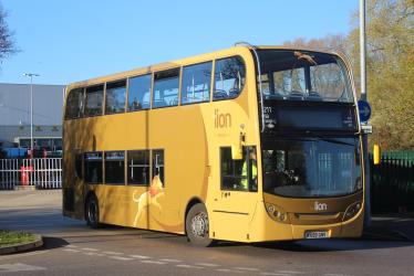 Double decker bus with lion branded livery