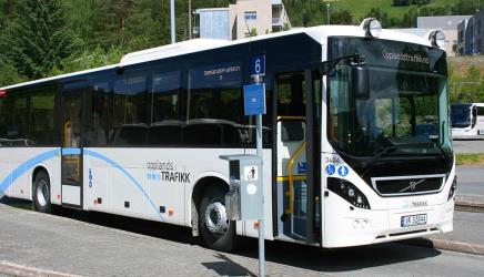 Bus side view showing front entry