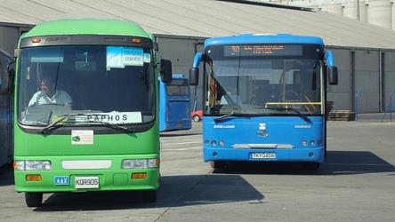 The intercity green and blue urban bus